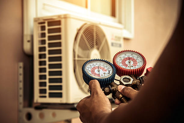 Professional Heat Pump Repair technician working in Bailey, CO